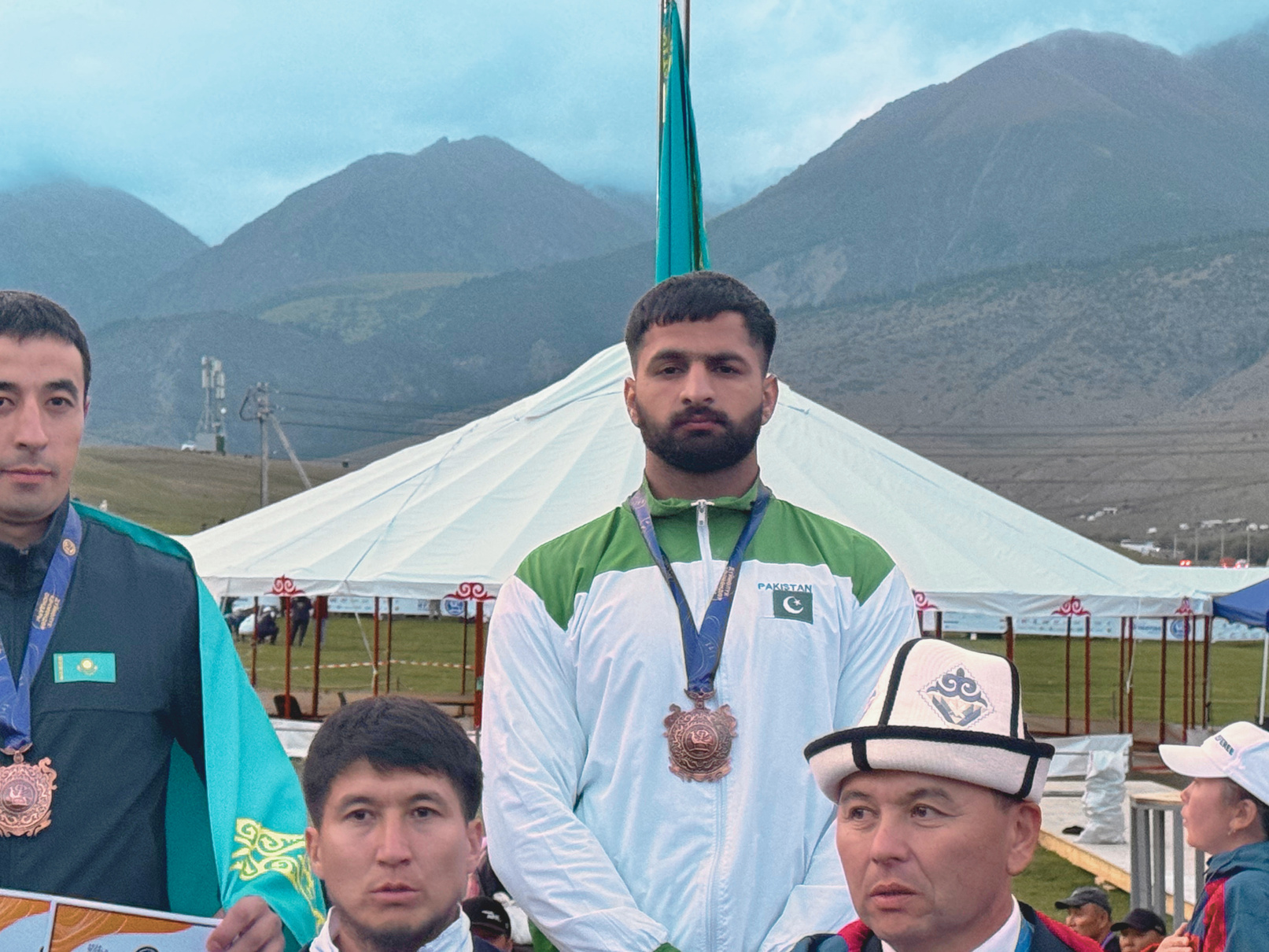 Muhammad Asim with teammates and officials